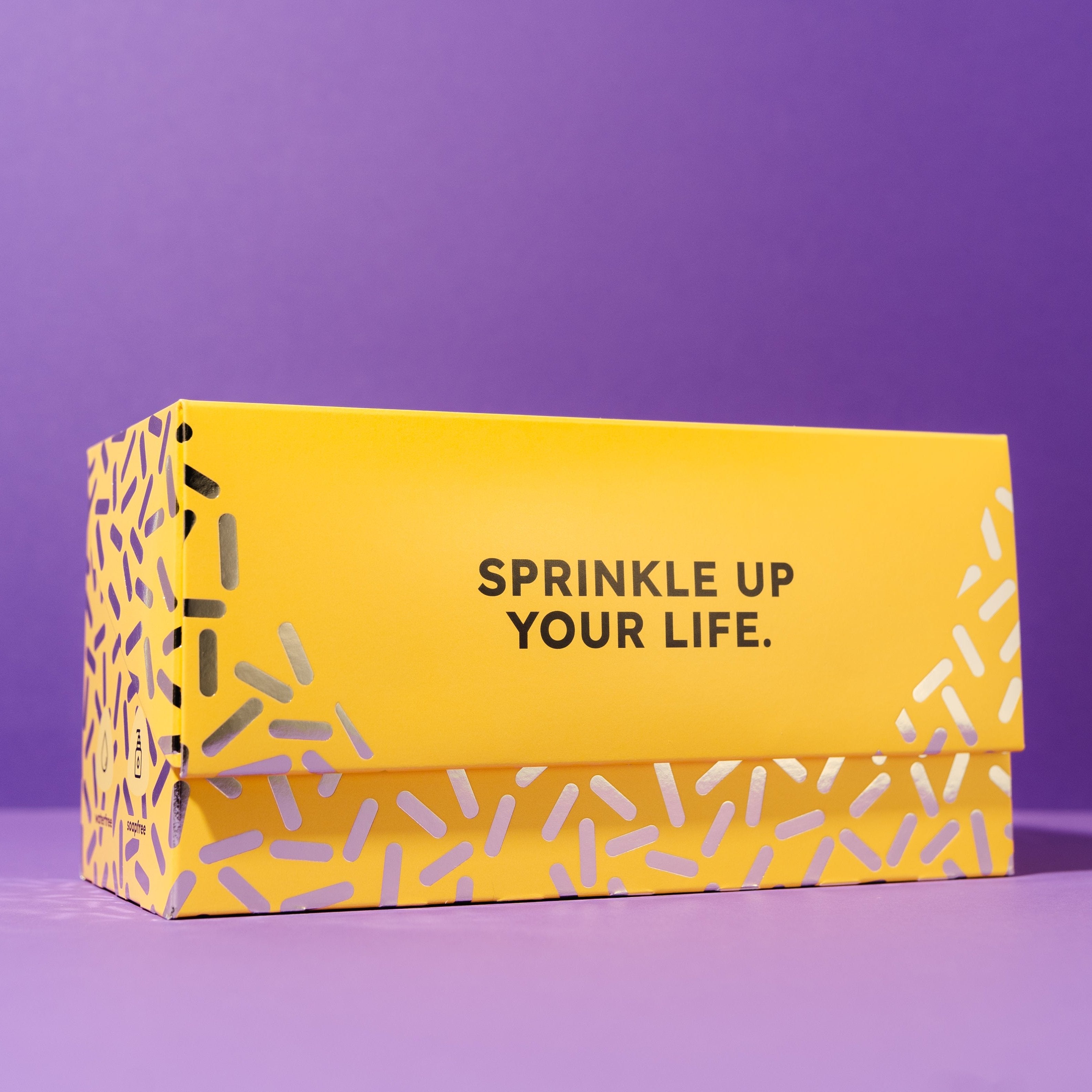 solid-geschenkset-vor-lila-hintergrund